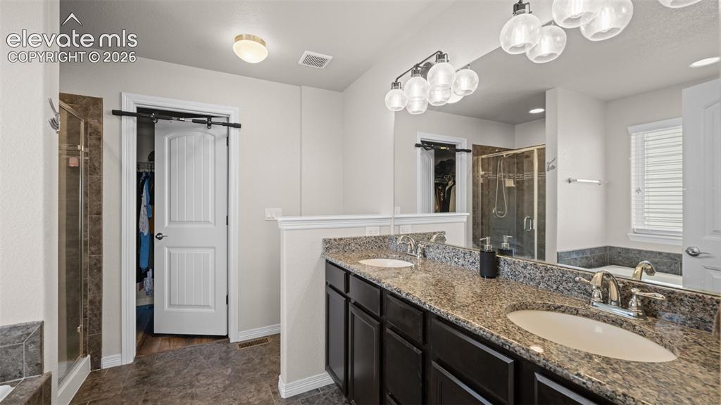 Image 22 of 42: Master Bathroom