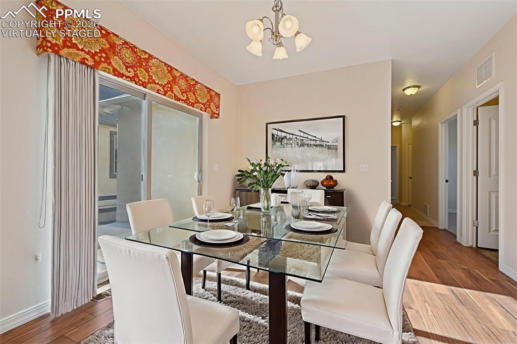 Image 10 of 41: Virtually staged dining area for concept only