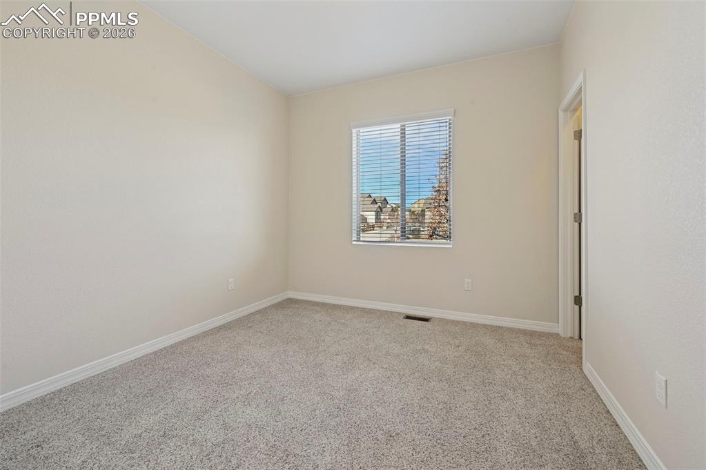 Image 26 of 41: Bedroom 2 with walk-in closet