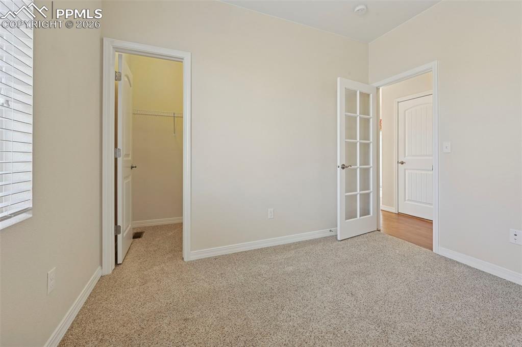 Image 27 of 41: Bedroom 2/Optional office with good natural light