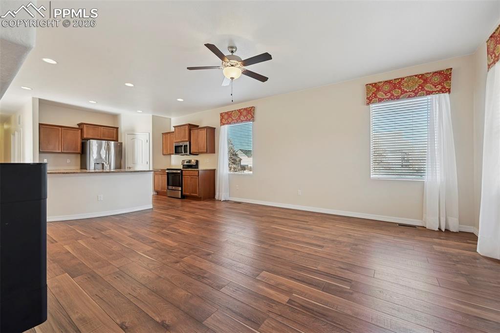 Image 5 of 41: Enter spacious living room with great flowLiving Room