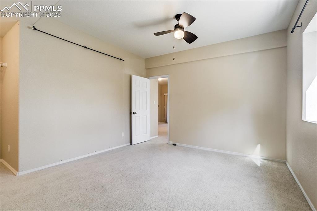 Image 39 of 50: One of 2 basement bedrooms
