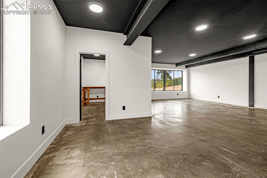 Image 17 of 50: Bedroom 1 In law suite with walk-in closet. Lower level.