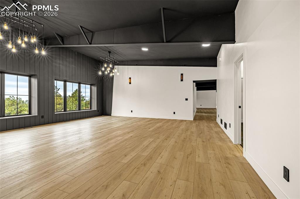 Image 32 of 50: Sun room, light-filled for reading, yoga or a creative space. Upper level.