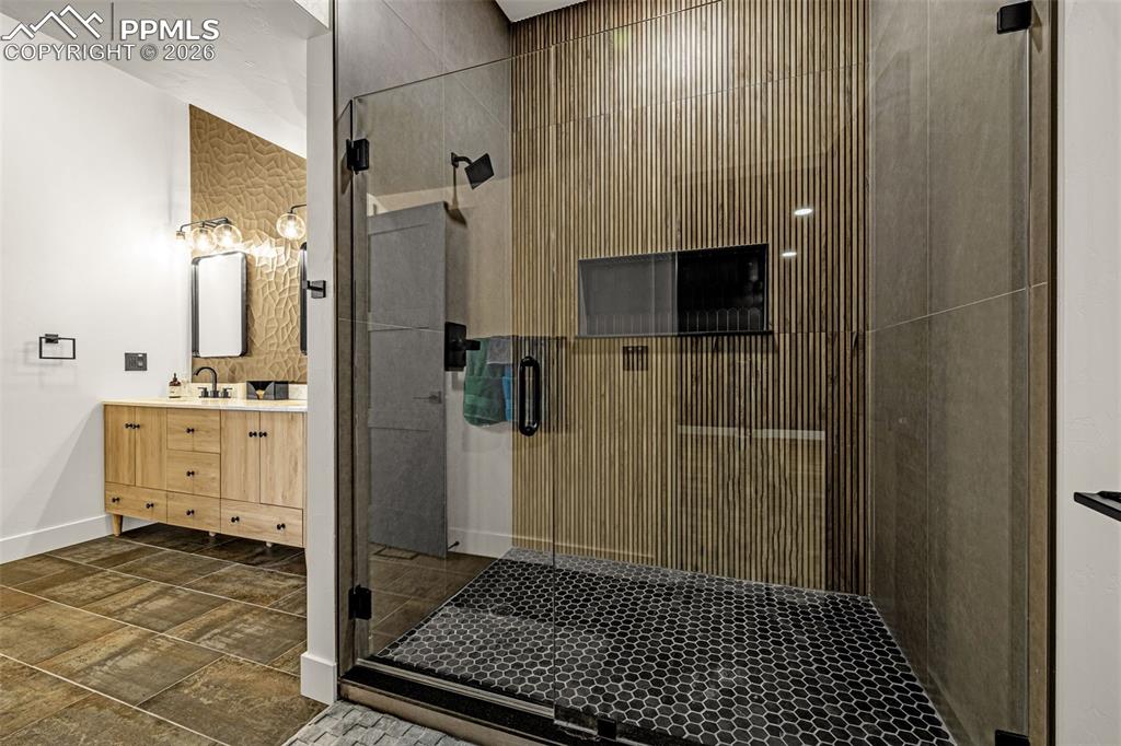 Image 41 of 50: Primary bathroom shower. Upper level.