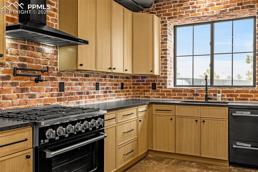 Image 6 of 50: Kitchen with two (2) dishwashers and garbage disposal.
