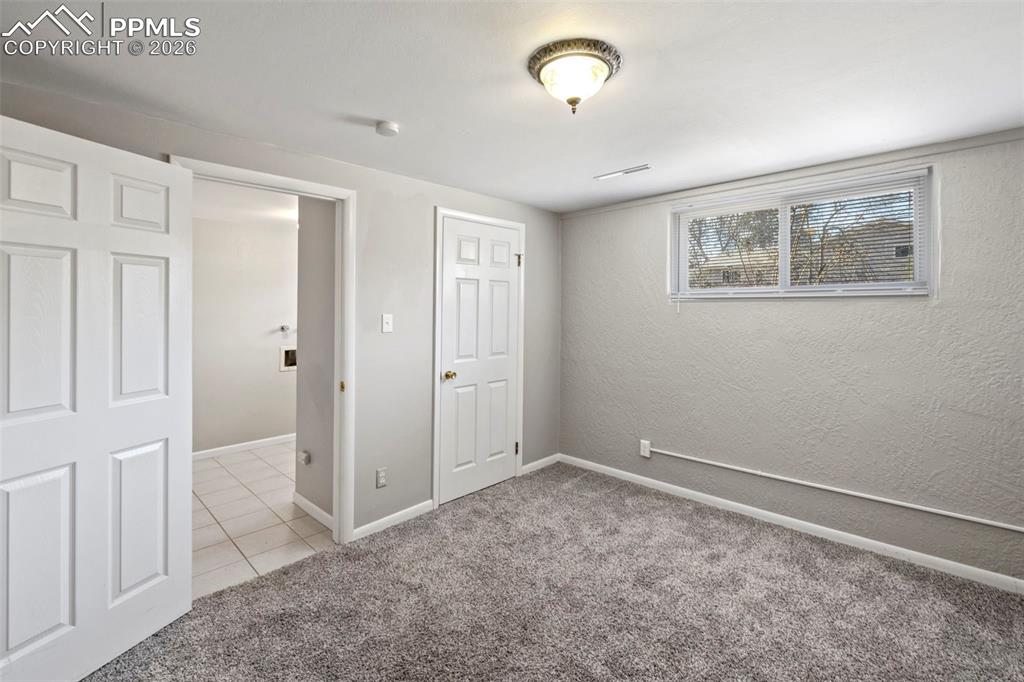 Image 30 of 50: Bedroom