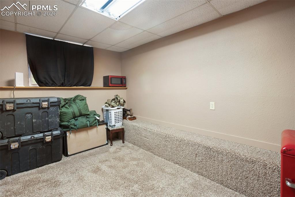 Image 13 of 31: Main level bedroom