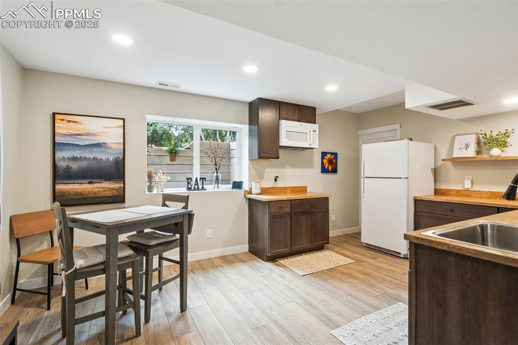 Image 42 of 49: Basement dining space