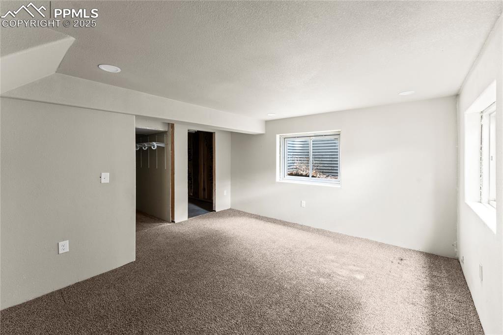Image 10 of 22: Basement level living/Bedroom