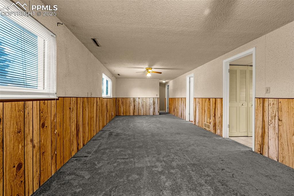 Image 11 of 14: Lower living room