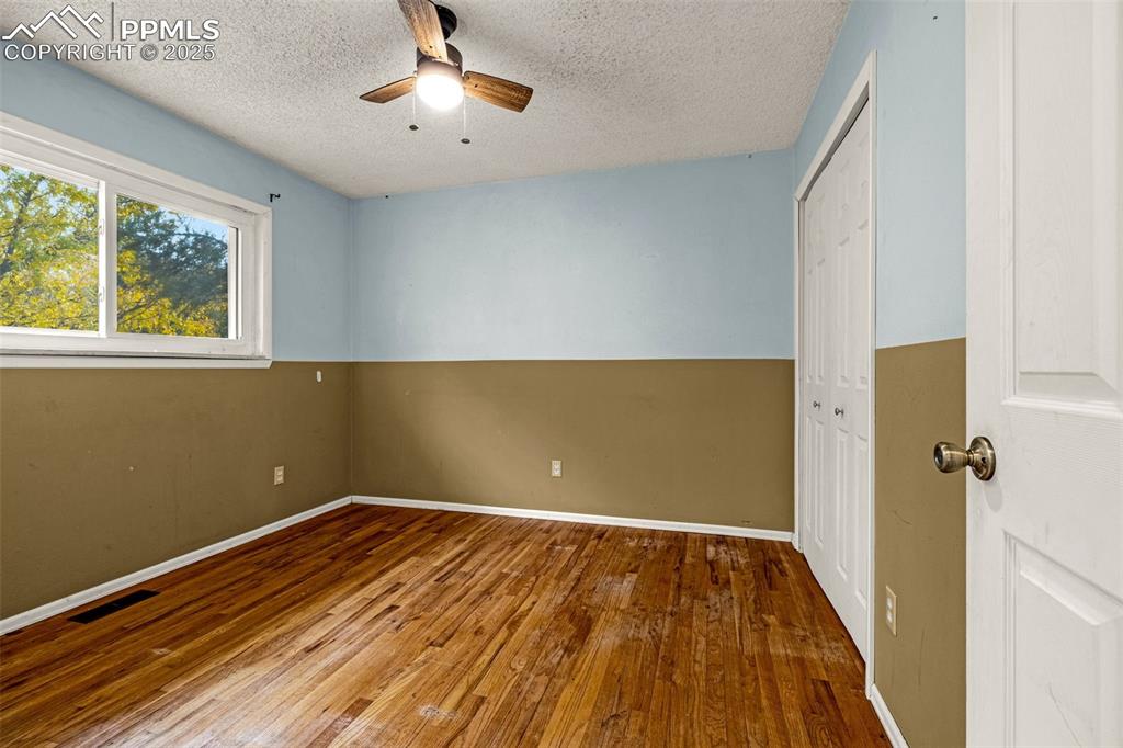 Image 8 of 14: Upstairs bedroom