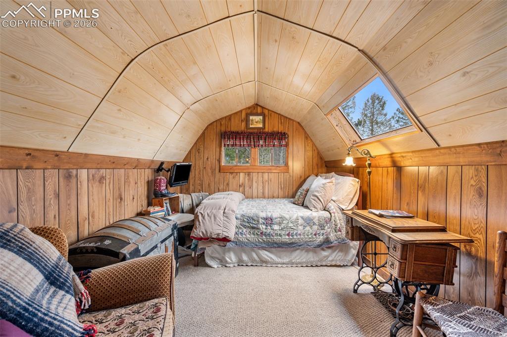 Image 21 of 34: Guest quarters, cozy and full of character, offering a charming retreat wit