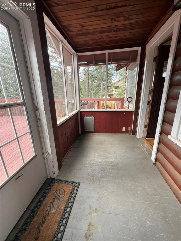 Image 14 of 23: Unfurnished sunroom featuring plenty of natural light