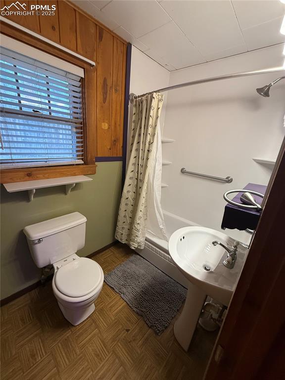 Image 8 of 23: Full bath featuring toilet and a shower with curtain