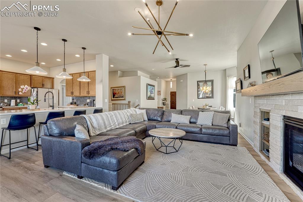 Image 10 of 50: Open floor plan with designer lighting throughout