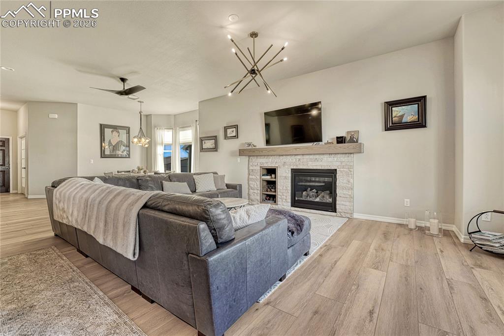 Image 12 of 50: Hand stacked stone gas fireplace