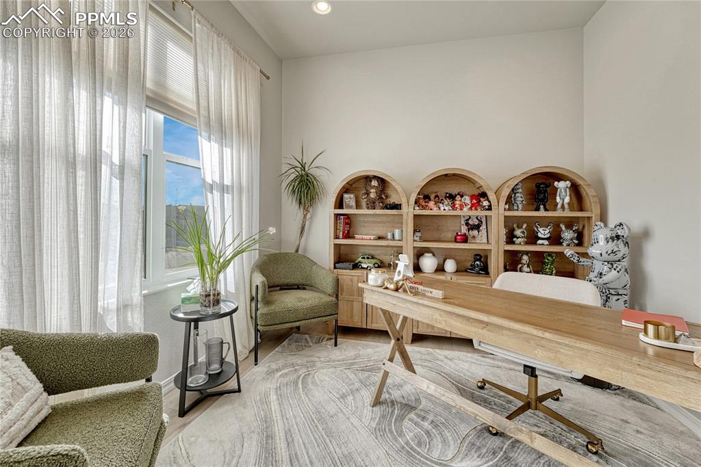 Image 22 of 50: Main level office, by the front door