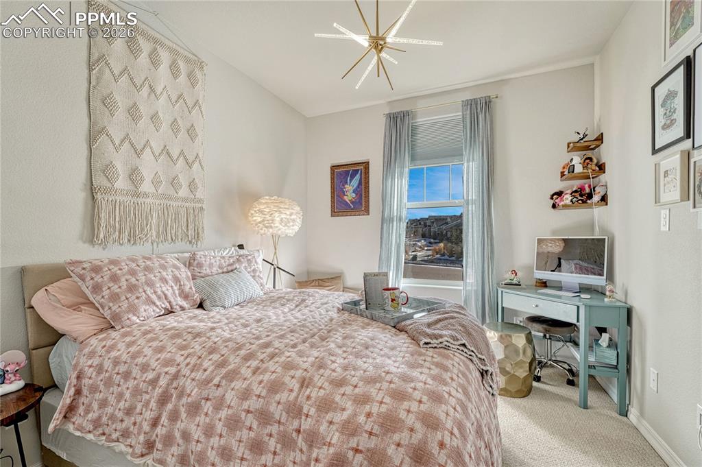 Image 25 of 50: Second main level bedroom