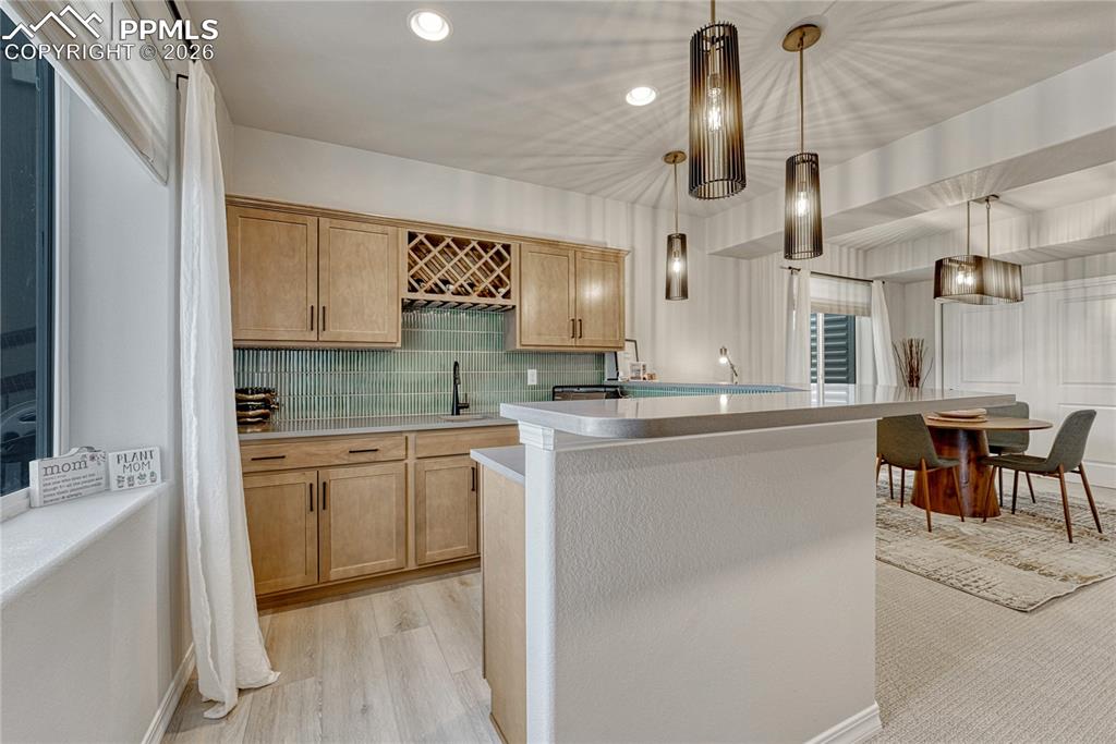 Image 31 of 50: Designer lighting throughout