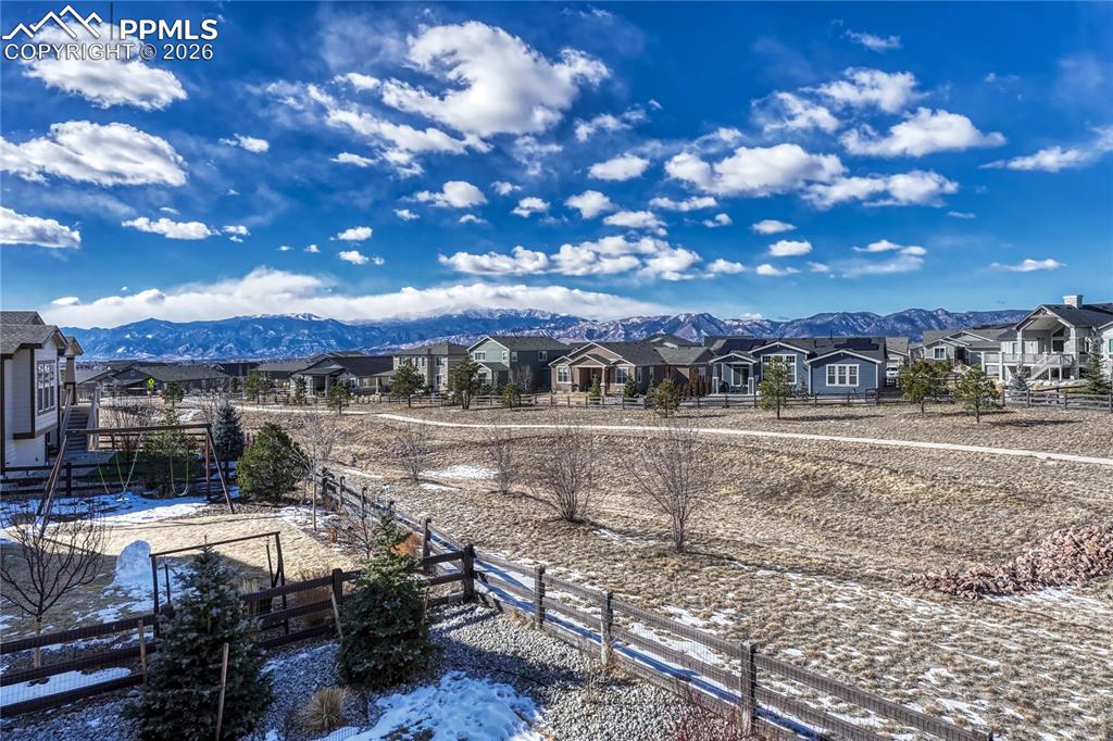 Image 43 of 50: Unobstructed Mountain views can be seen from living room, patio, lower leve