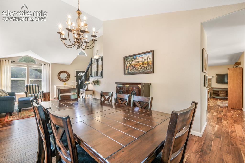 Image 12 of 50: View of entry way, front living room and access into dining