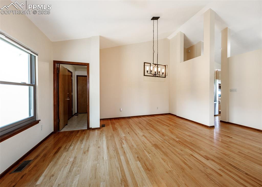 Image 14 of 44: Extensive main level hardwood flooring