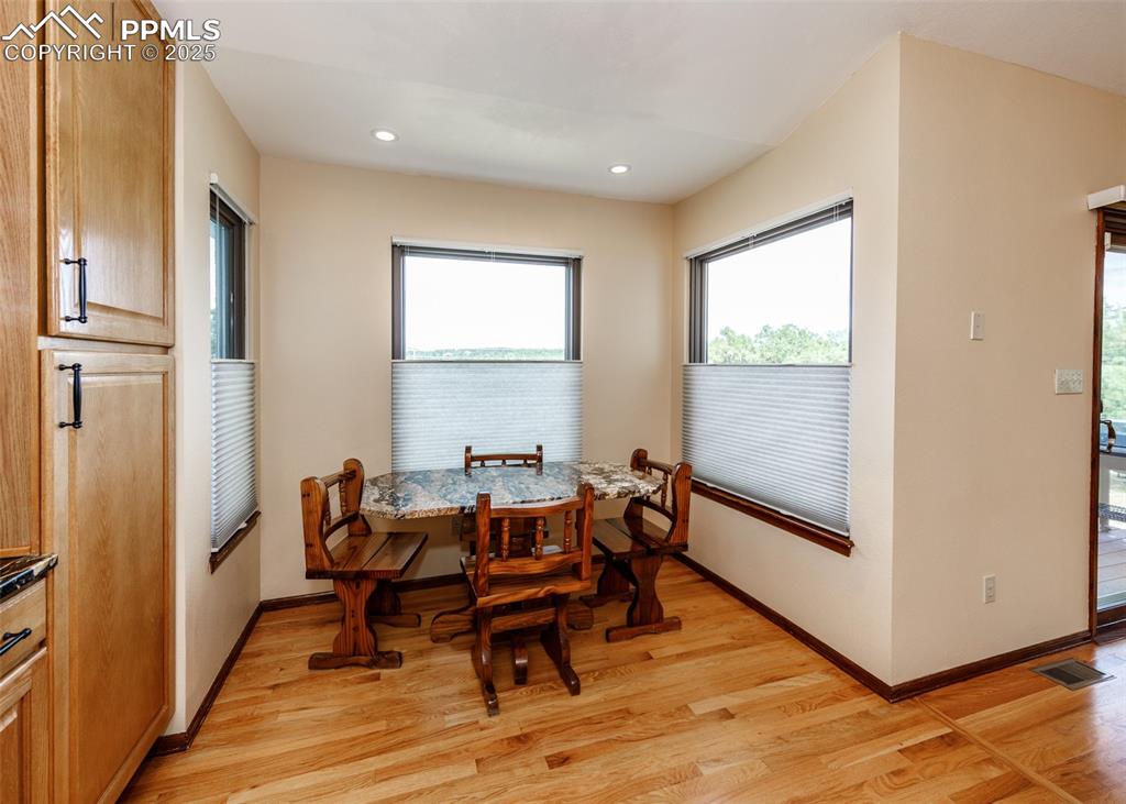 Image 8 of 44: bright dining nook with great views