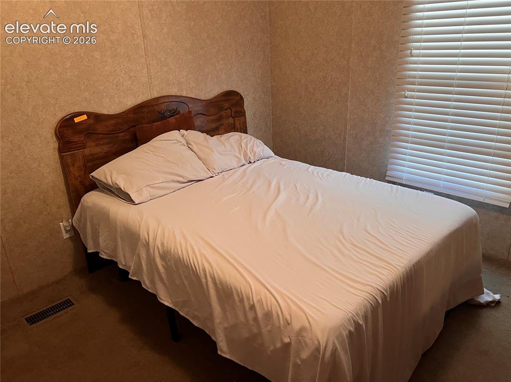 Image 12 of 22: Bedroom