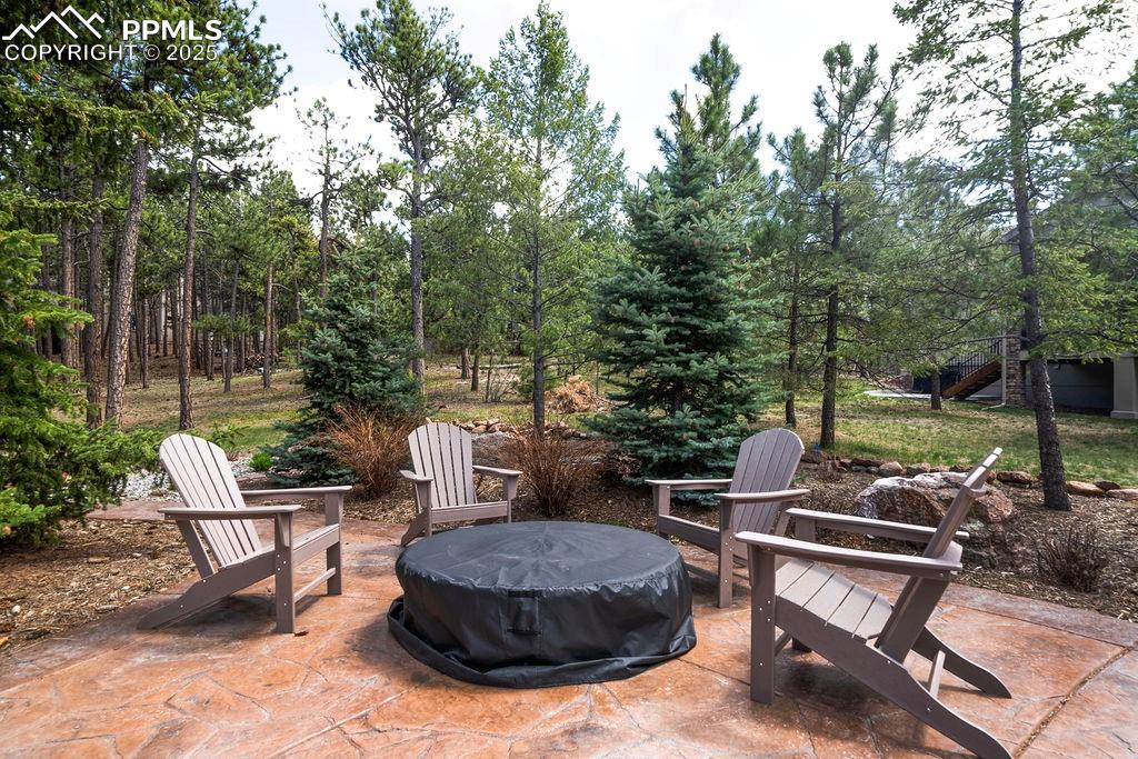 Image 41 of 42: View of patio / terrace with a fire pit