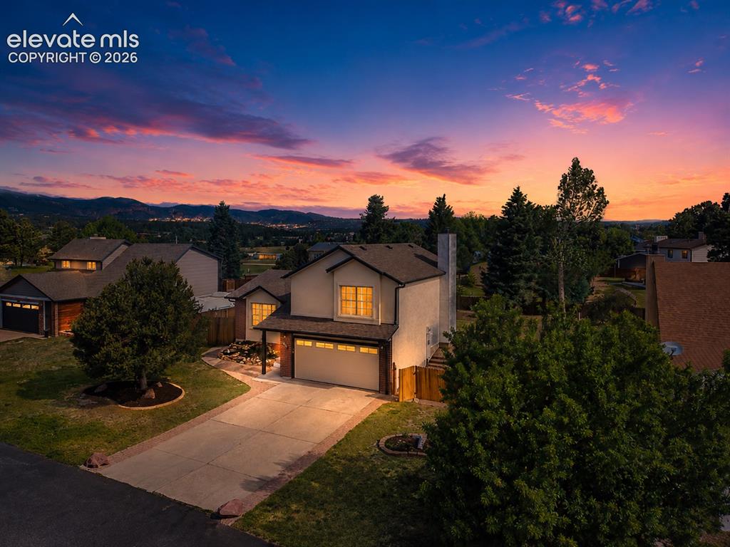 Image 3 of 50: Welcome home to this charming Monument property offering mature trees, esta