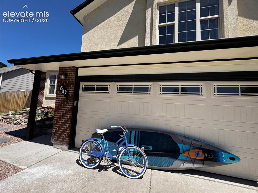 Image 45 of 50: Paddleboard and cruiser bike included in the sale of the home as a welcome
