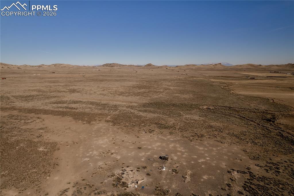 Image 16 of 16: View of undeveloped land with rural landscape