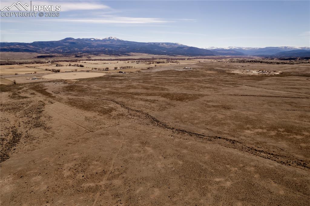 Image 6 of 16: View of mountain backdrop featuring rural landscape