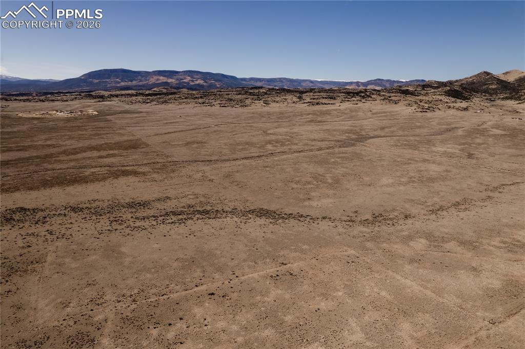Image 8 of 16: View of mountain background featuring a desert landscape and rural landscap