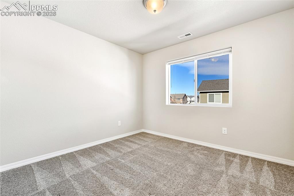 Image 16 of 38: Bedroom