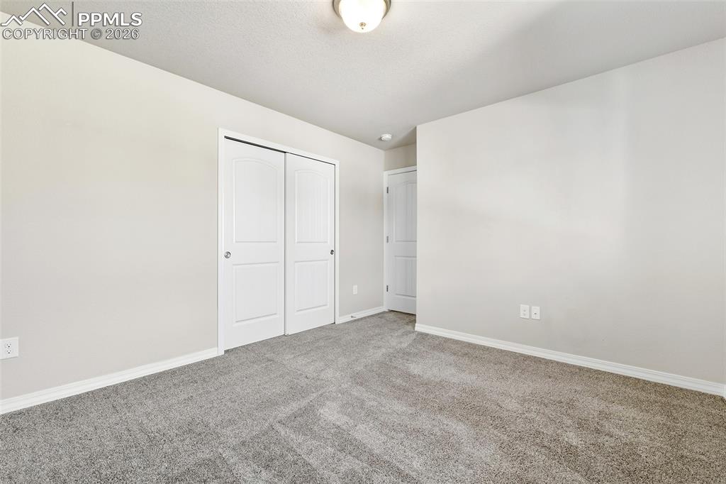 Image 19 of 38: Bedroom