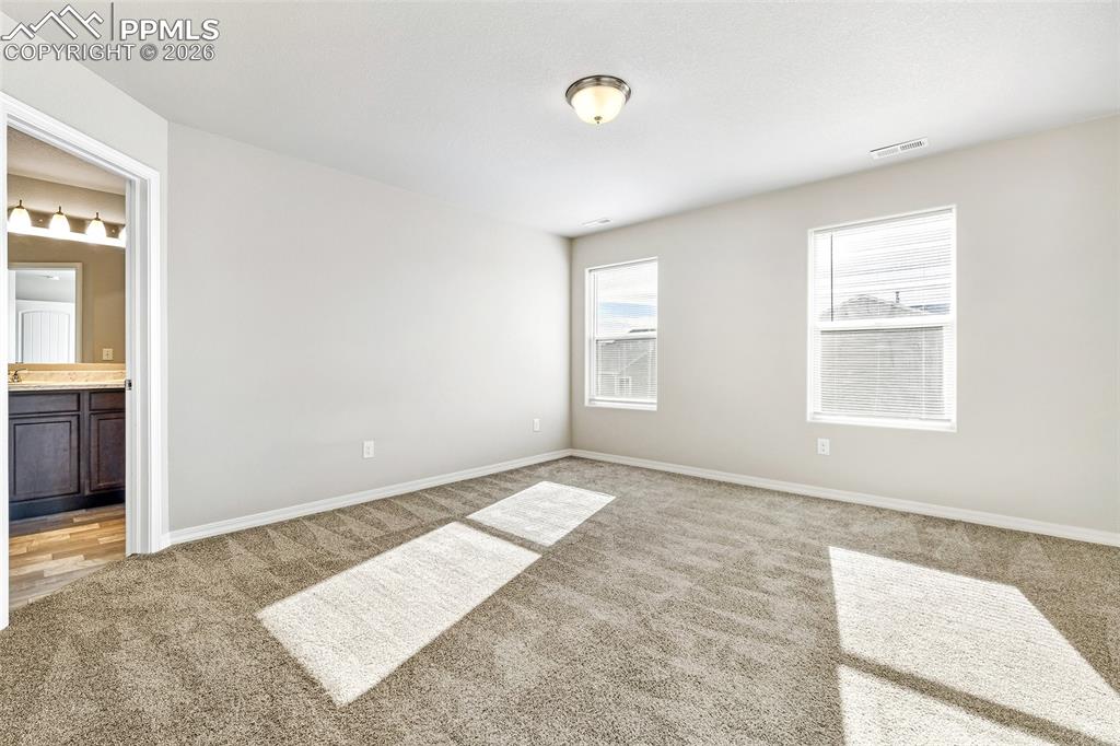 Image 20 of 38: Master Bedroom