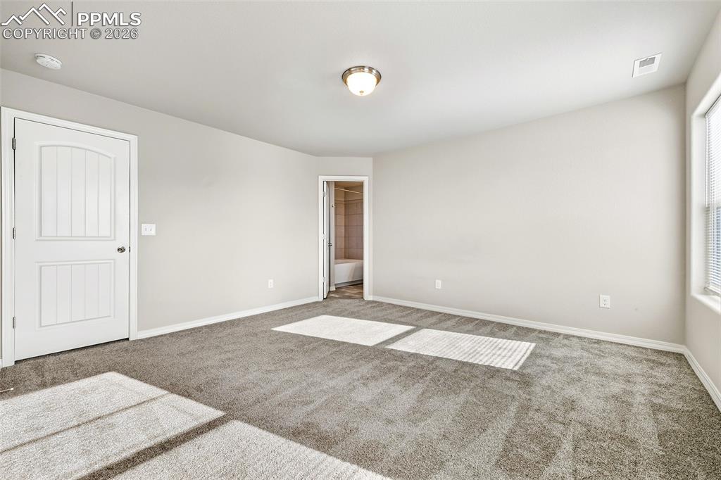 Image 23 of 38: Master Bedroom