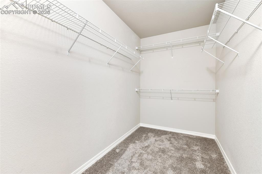 Image 30 of 38: Primary Closet