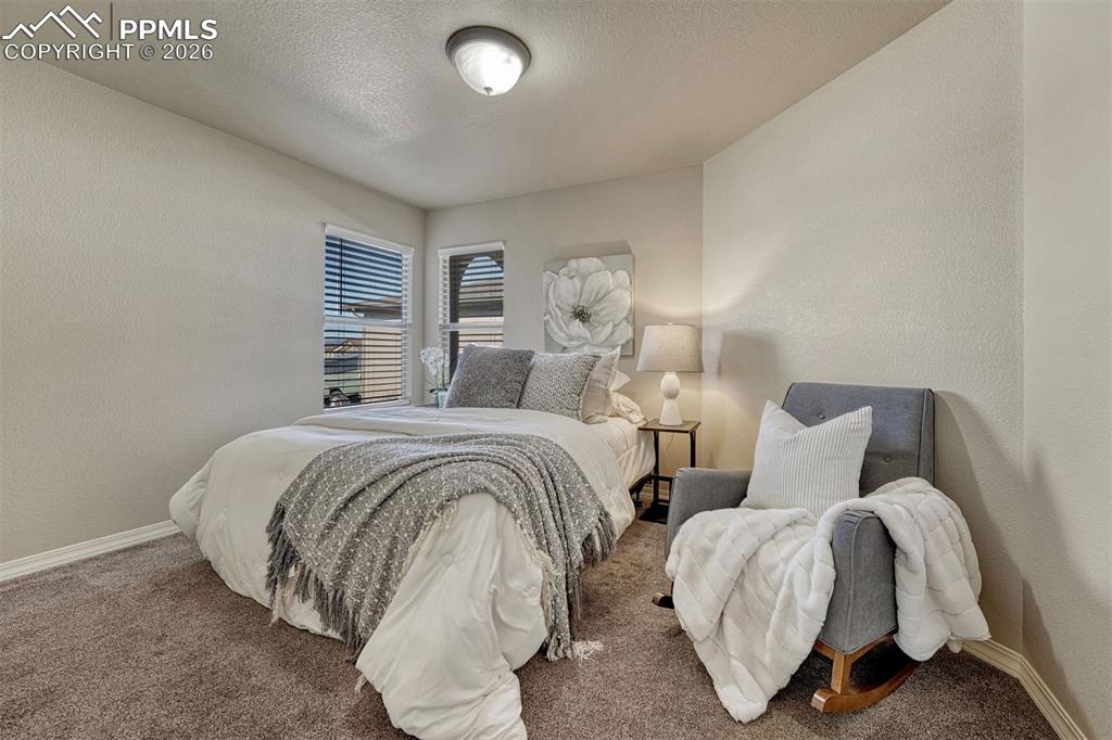 Image 13 of 41: Perfect for family, guests, or a home office — comfortable and inviting sec