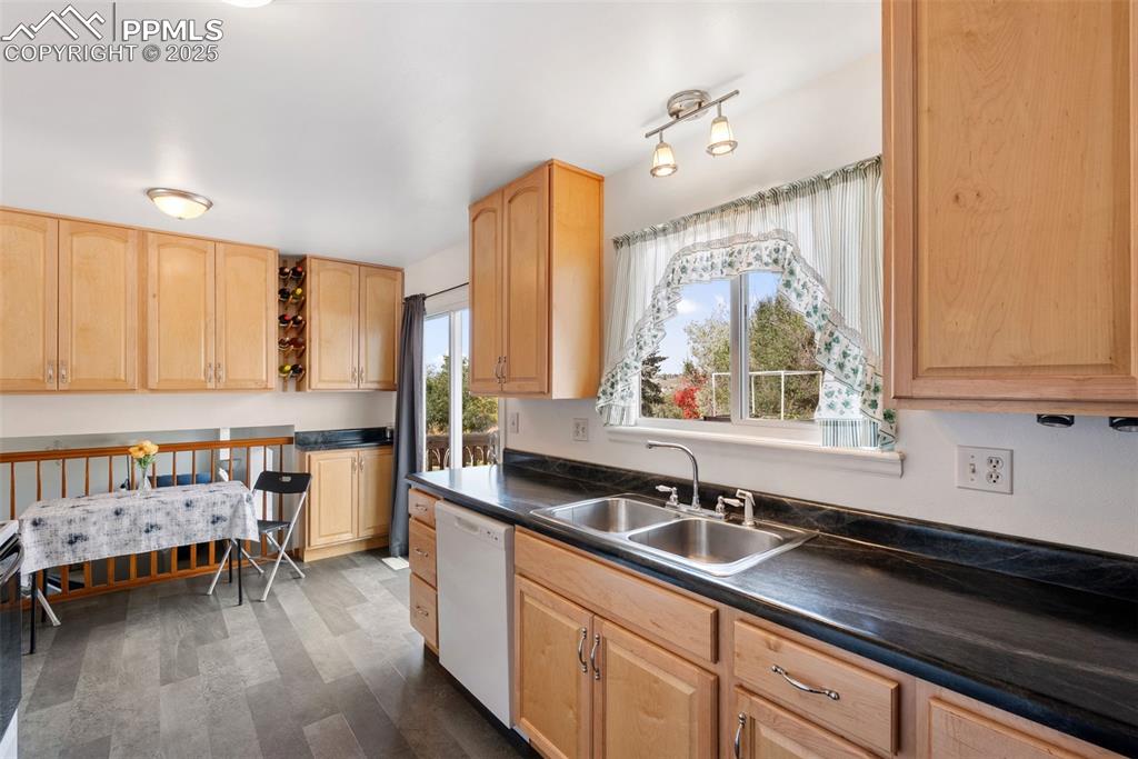 Image 11 of 42: Plenty of storage for appliances and a good amount of counter space as well