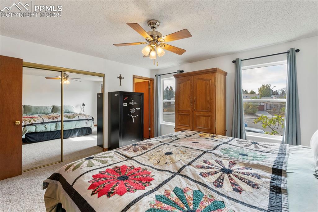 Image 18 of 42: The primary bedroom is quite large and has an adjoining bathroom