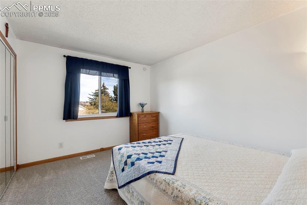 Image 26 of 42: Third bedroom