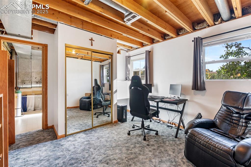 Image 33 of 42: Continue through the pocket door to the utility and laundry room.