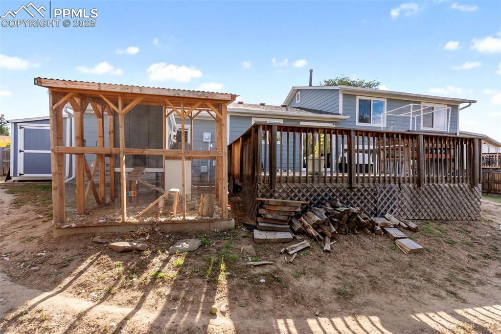 Image 41 of 42: Custom made chicken coop with its own solar powered, automatic chicken coop