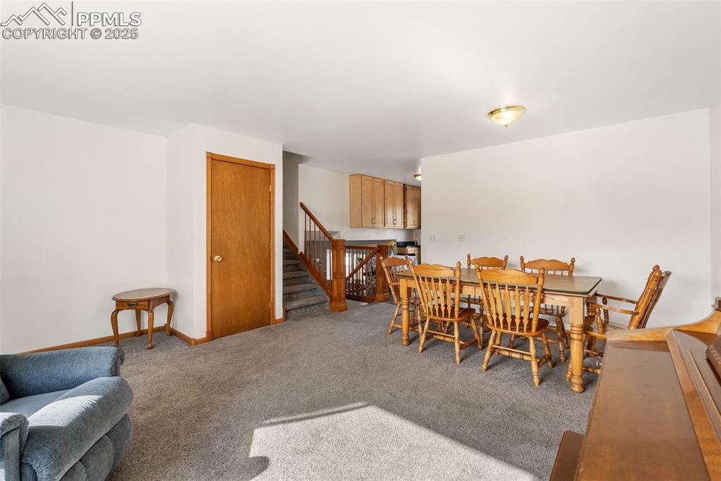 Image 7 of 42: Store your coats in the entry closet then head up a few steps to the bedroo