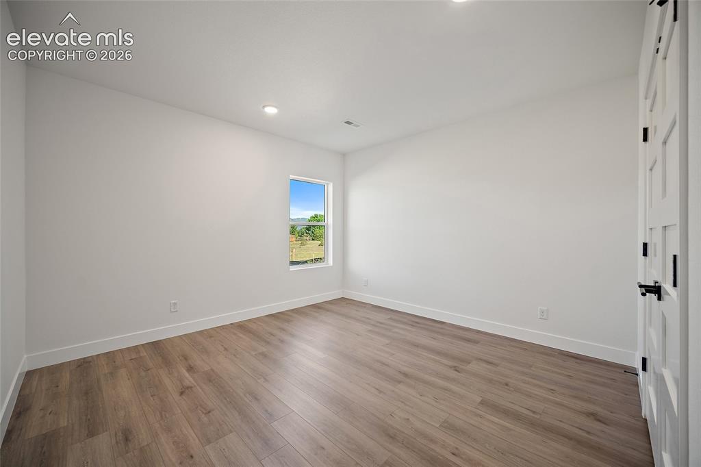 Image 43 of 49: Basement Bedroom #1