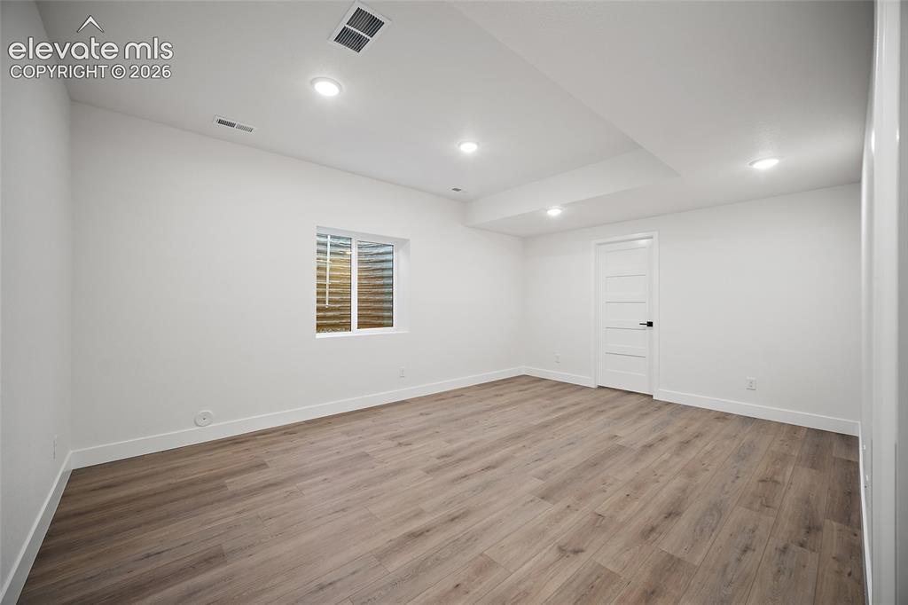 Image 46 of 49: Basement Jr Suite with walkin closet and attached bathroom