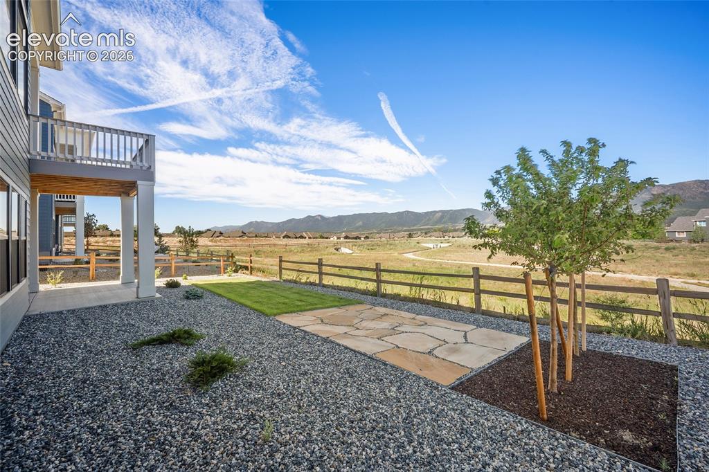 Image 6 of 49: Landscaped Backyard